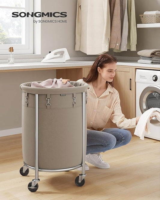 SONGMICS 29-Gallon (110 L) Laundry Basket with Wheels, Rolling Round Heavy-Duty Laundry Hamper Cart with Steel Frame and Removable Bag, 2 Locking Wheels, Camel Brown and Metallic Silver URLS002N01