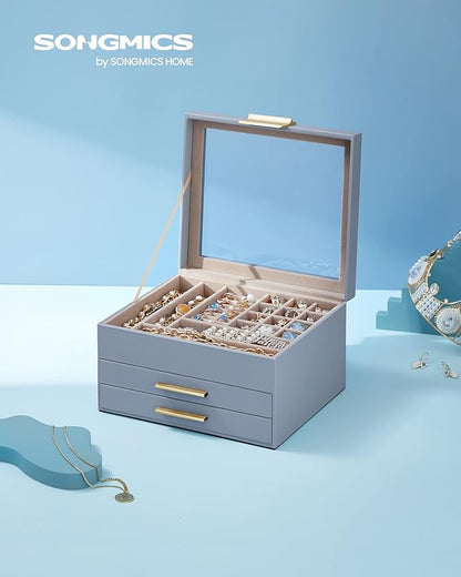 SONGMICS GISELLA Collection - Jewelry Box Organizer, 3-Layer Jewelry Storage with 2 Drawers, Shiny Metal Hardware, Glass Lid, Modern, 8 x 9.1 x 5.3 Inches, Smoky Blue and Gold Color UJBC239Q01