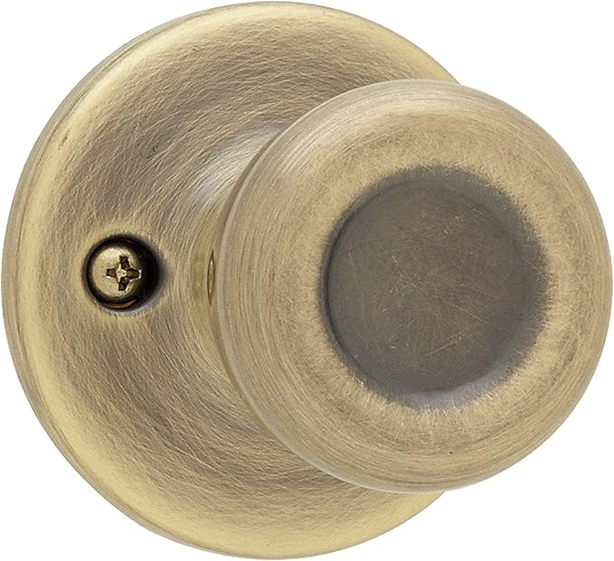 Kwikset Tylo Dummy Door Knob, Single Sided Handle for Closets, French Double Doors, and Pantry, Antique Brass Non-Turning Interior Push/Pull Door Knob, with Microban Protection