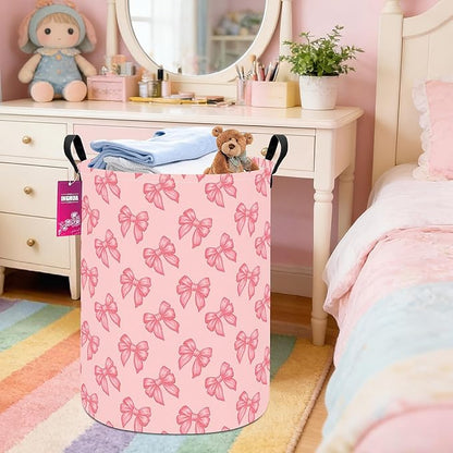 Laundry Hamper Large Canvas Fabric Lightweight Storage Basket/Toy Organizer/Dirty Clothes Collapsible Waterproof for College Dorms, Boys and Girls Bedroom,Bathroom(Pink bowknots)