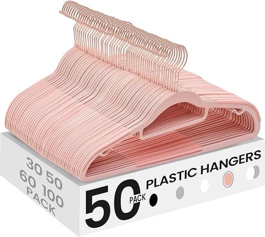 SONGMICS Pack of 50 Coat Hangers, Space-Saving Plastic Clothes Hangers, Non-Slip, 0.2 Inches Slim, 16.5 Inches Wide, 360° Swivel Rose Gold Hook, Light Pink UCRP20PK05