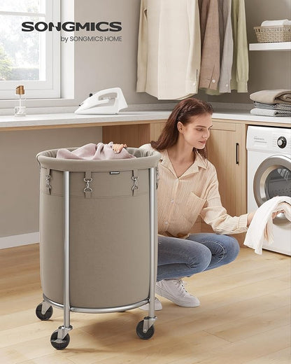 SONGMICS 29-Gallon (110 L) Laundry Basket with Wheels, Rolling Round Heavy-Duty Laundry Hamper Cart with Steel Frame and Removable Bag, 2 Locking Wheels, Camel Brown and Metallic Silver URLS002N01